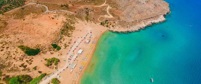 Aerial Birds Eye View Drone Agia Agathi Beach Near Feraklos Castle Rhodes Island Dodecanese Greece Panorama With Sand Beach Clear Blue