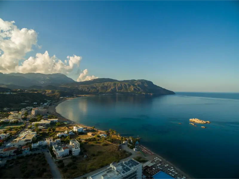 Aerial Shot Houses Beach By Calm Ocean Captured Karpathos Greece