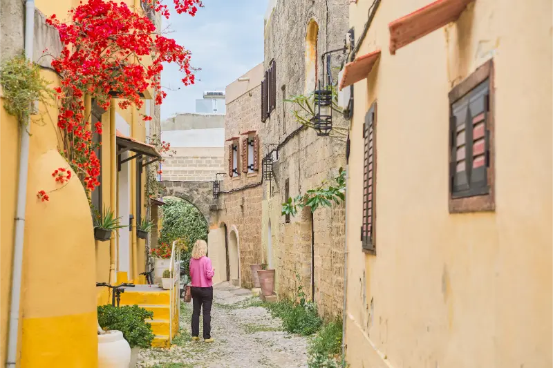 Walking Through Streets Old Town Rhodes Far From Places Adult Woman Walking Along Street Trip Places Dodecanese Archipelago Greece